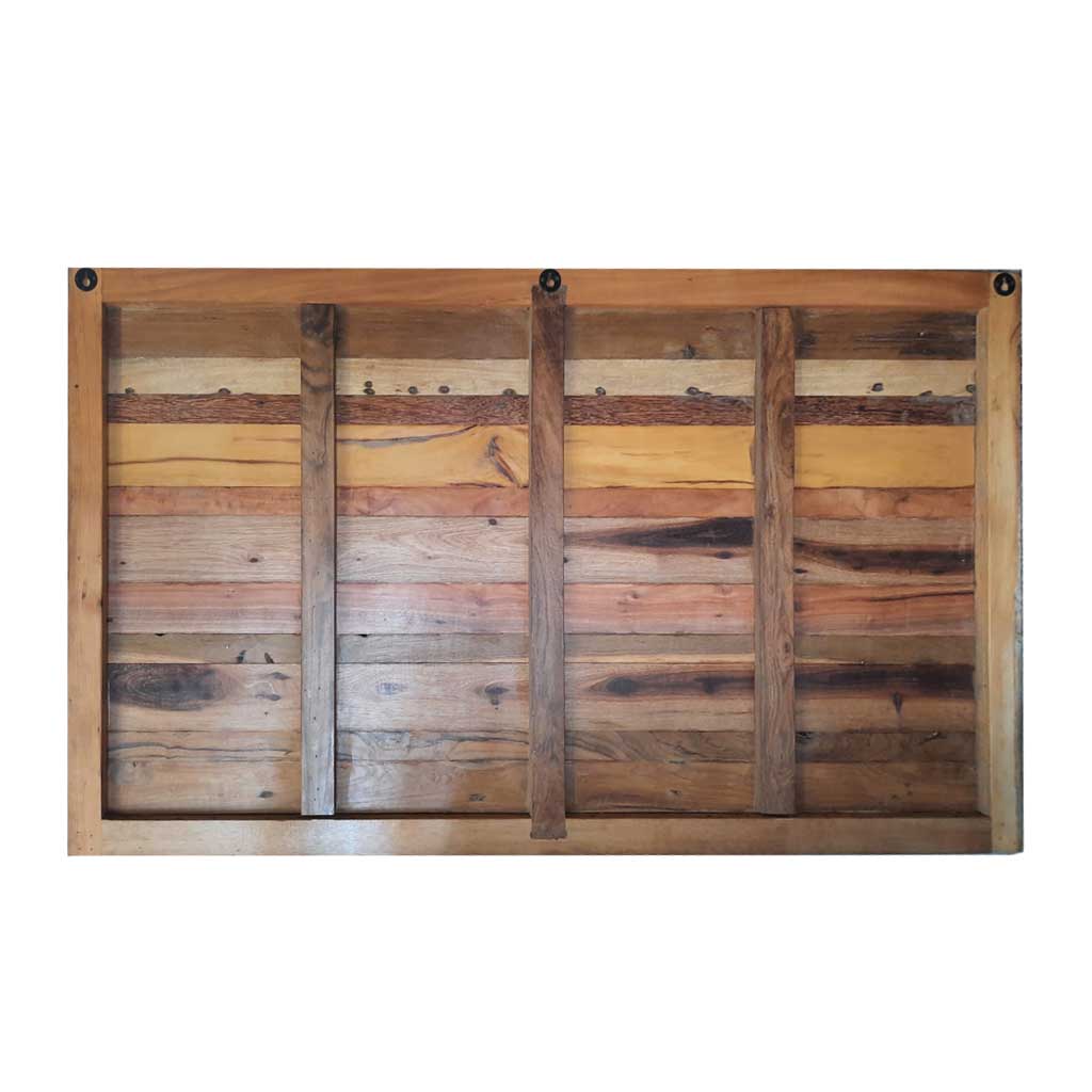 cabezal-casa-azul-trasero Parte trasera de un cabezal de madera
